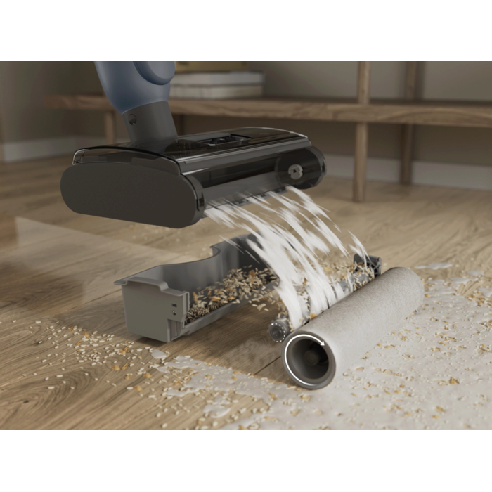 The DualAction nozzle features a high-efficiency brush-roll.
 It filters solid debris from liquid, ensuring nothing gets left behind.
 An integrated dust bin keeps disposal quick and mess-free.