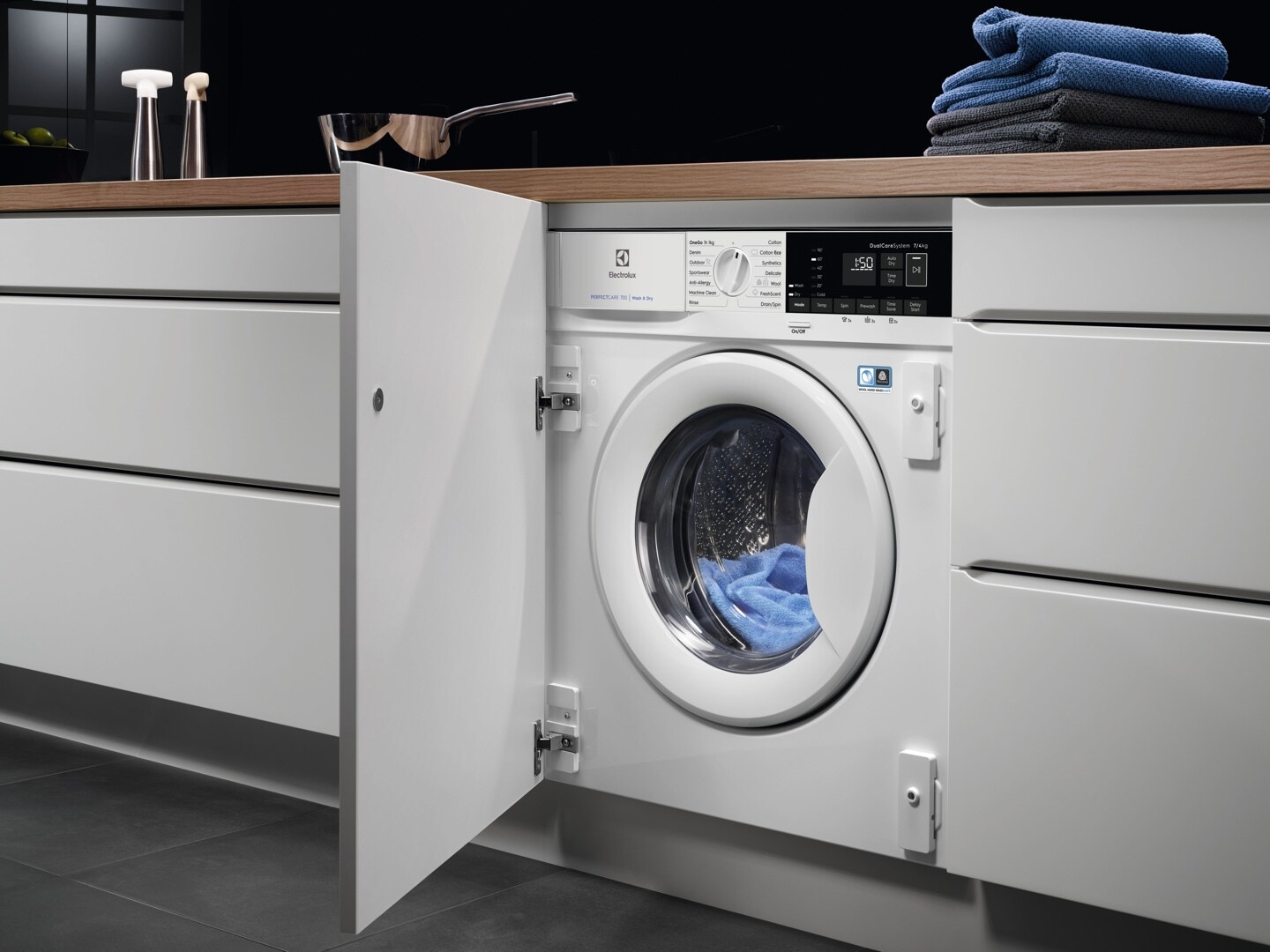 Integrated washer dryer in kitchen