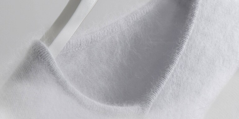 Белый шерстяной джемпер