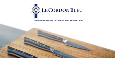 ножі на дошці